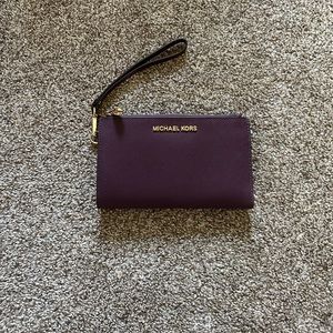Like new Michael Kors wallet with strap